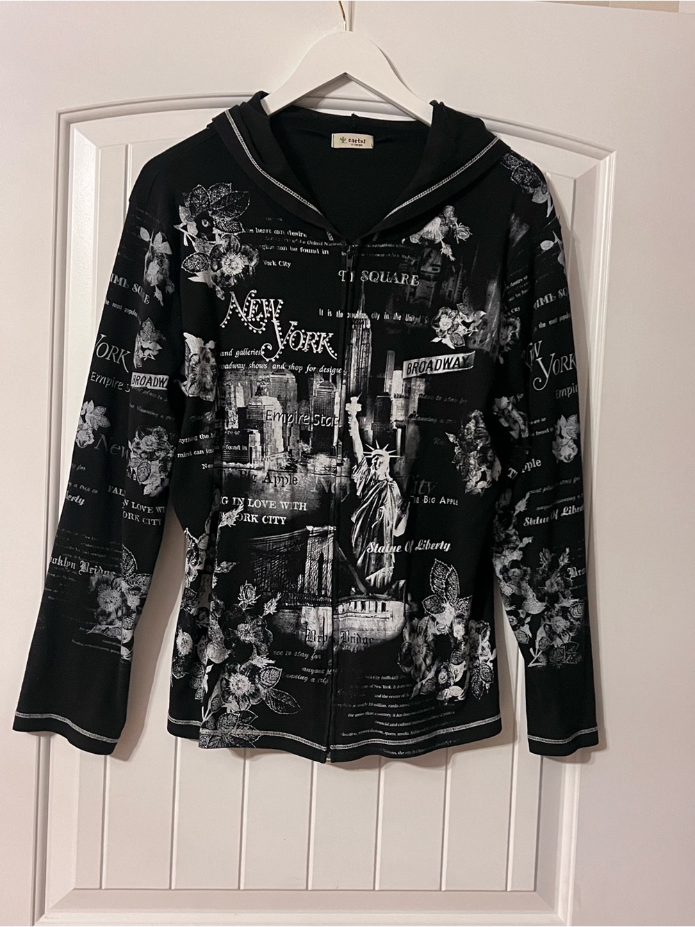 Ladies size XL- black zip-up hooded jacket with white New York City collage